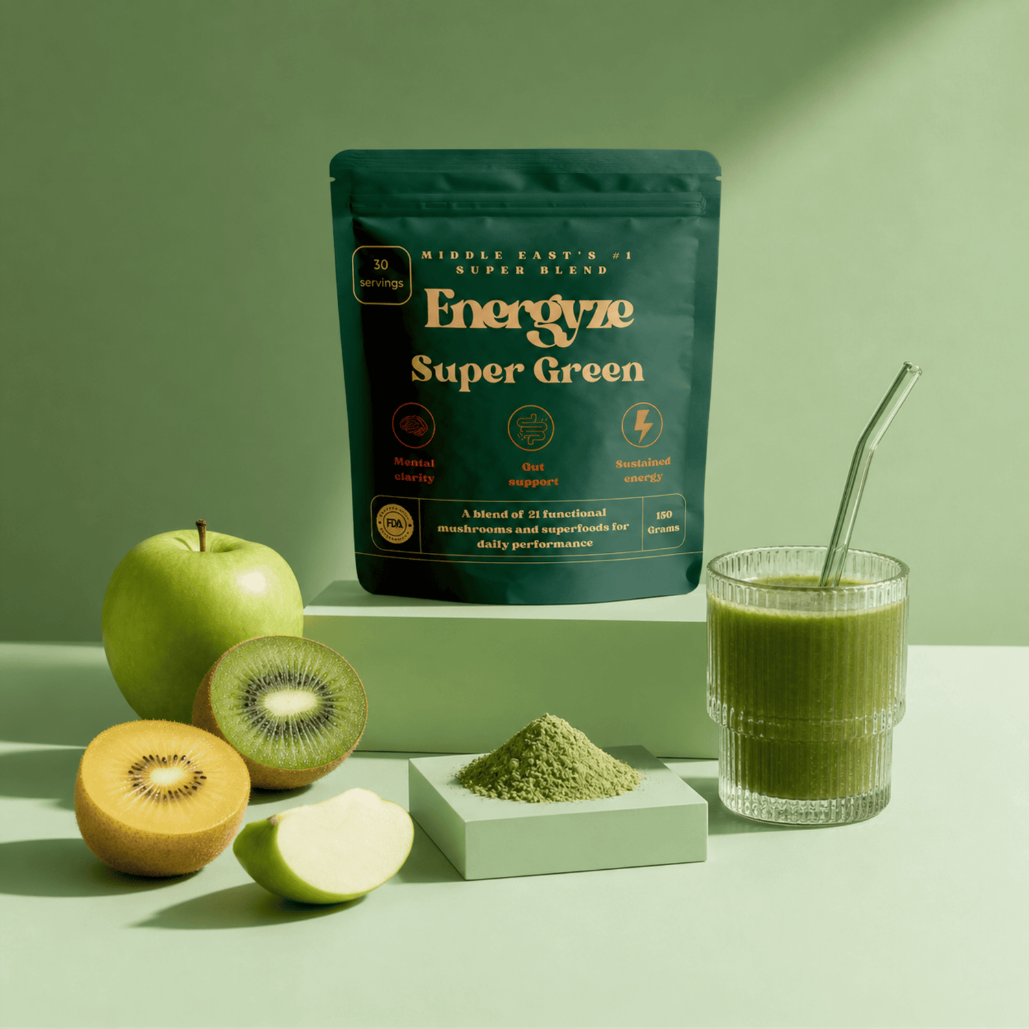 Energyze Super Green powder pouch with a glass of green juice, green apple, kiwi, and powder on a green background